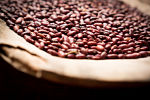 Red dried beans in a wooden bowl 